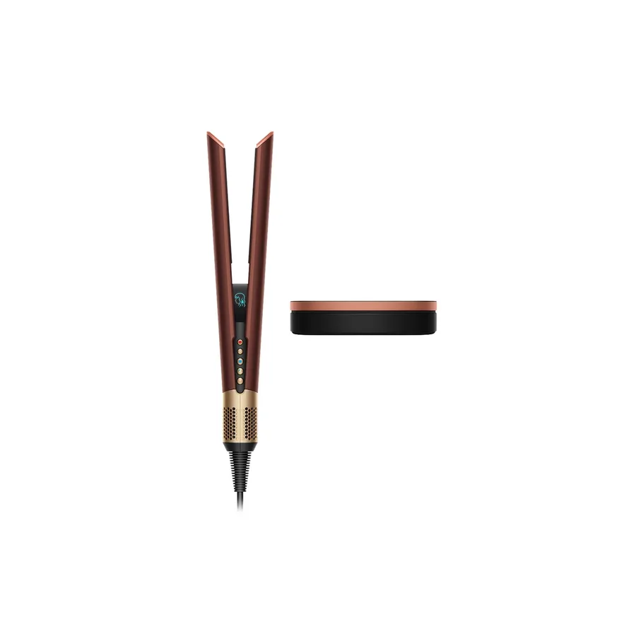 Plum and copper straightener beside its presentation case