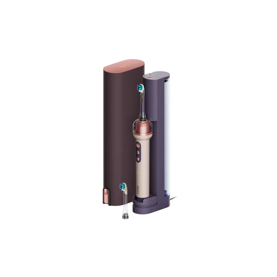 Ceramic pink toothbrush standing on its refill dock
